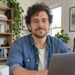 A man bursting out laughing, as a GIF with meme captions